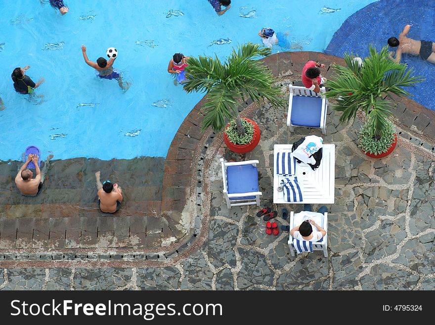 Photograph of pool with peoples in it. Photograph of pool with peoples in it