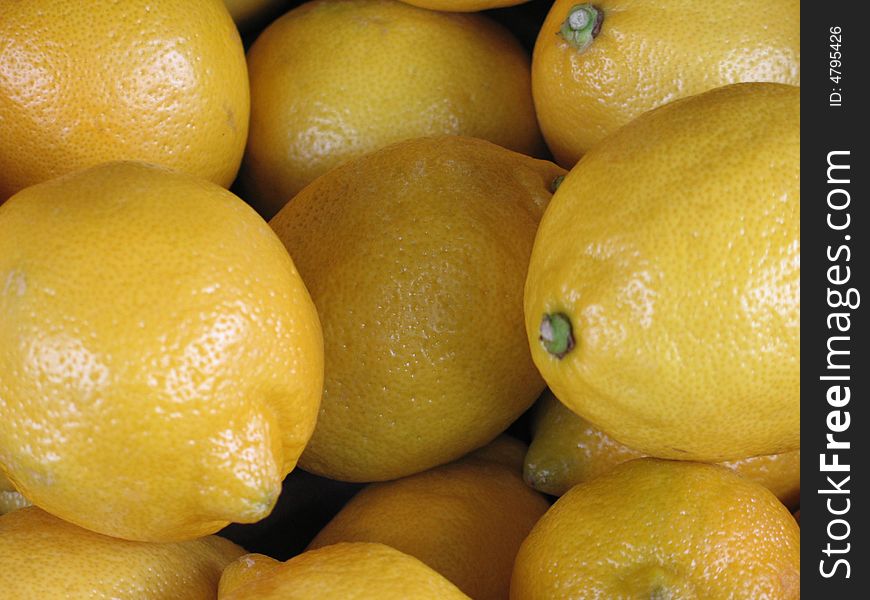 Pile of fresh yellow lemons. Pile of fresh yellow lemons