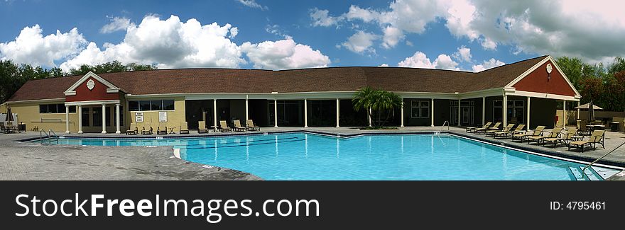 This is a pool and a club house in florida. This is a pool and a club house in florida