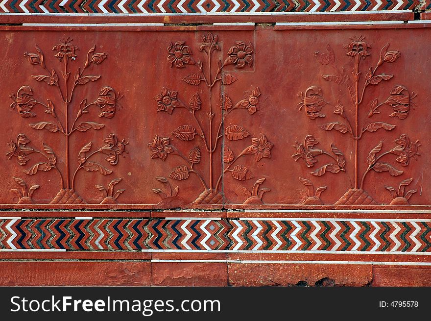 India, Agra: Taj Mahal mosque; detail of a carved stone wall decoration