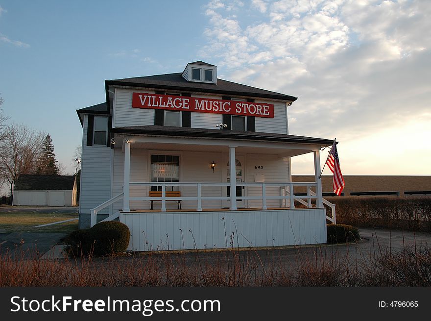 A cottage style music store found in sub urban area. A cottage style music store found in sub urban area.