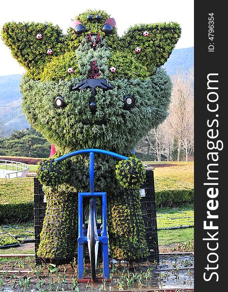 Beautiful sculpture with flowers, mascot carton