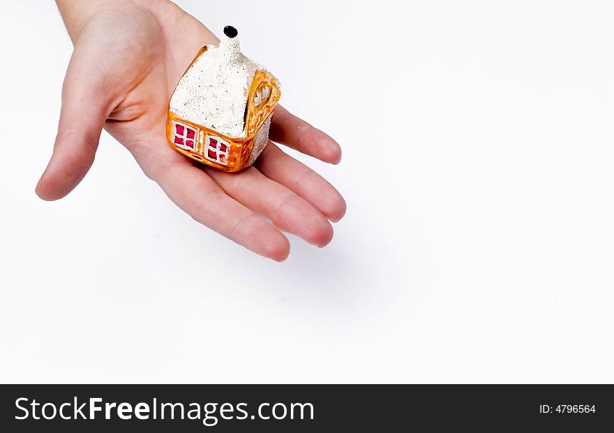 House on hand against the white background