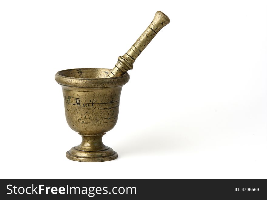 Ancient bronze mortar with pestle on white background