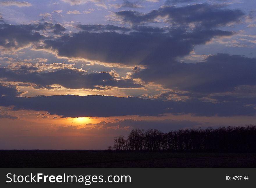 Sunset light and colourful clouds