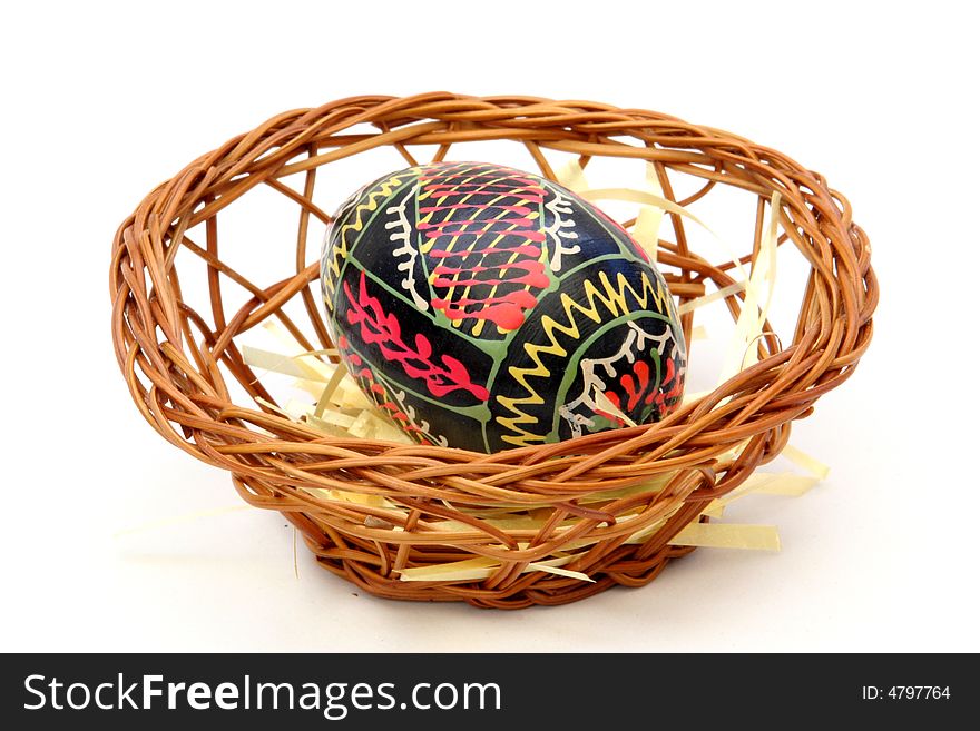 Easter Eggs in a basket with white background