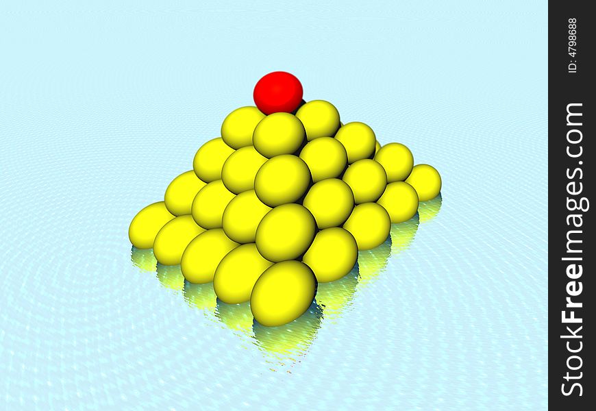 Pyramid consisting of yellow spheres with red top