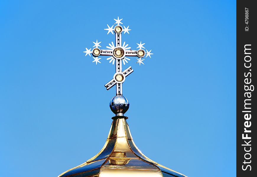 Gilded Cross on the Top of the Chapel Dome