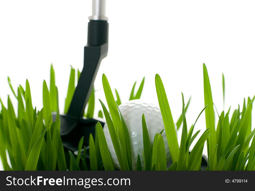 Golf ball on green grass isolated on white. Golf ball on green grass isolated on white
