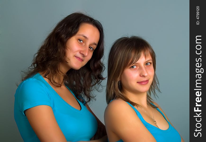 Two pretty ladies with brown and blond hair. Two pretty ladies with brown and blond hair