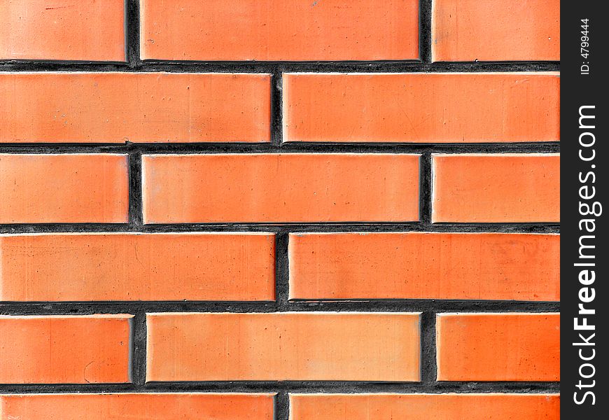 Wall made of red and yellow bricks. Wall made of red and yellow bricks