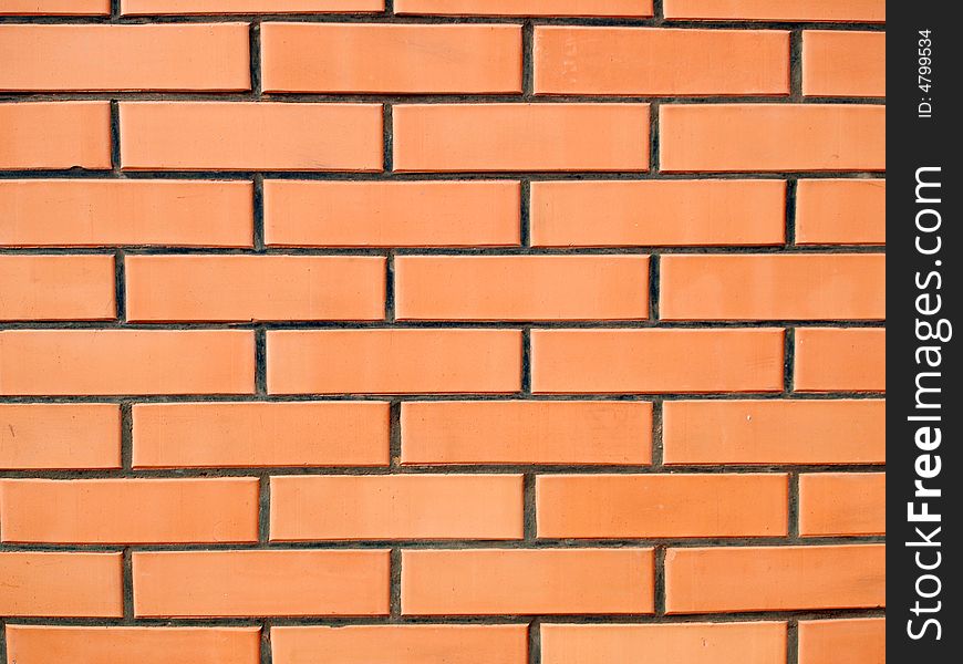 Wall made of red and yellow bricks. Wall made of red and yellow bricks