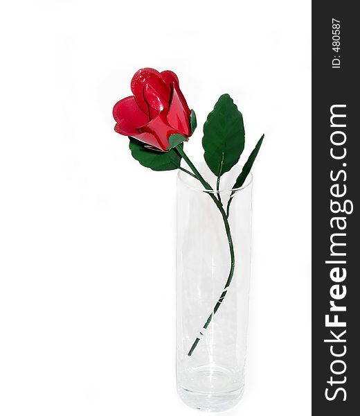 Metal red rose in etched glass vase. Metal red rose in etched glass vase
