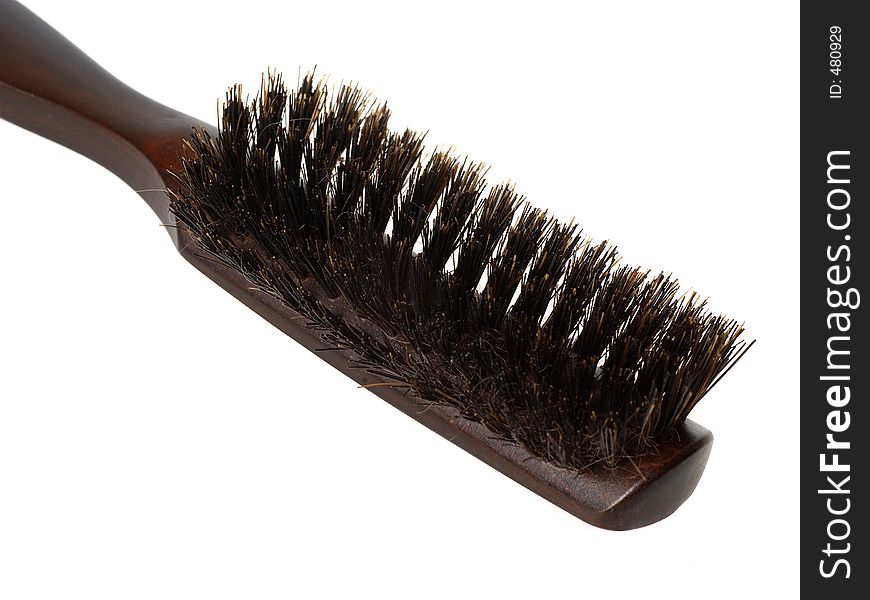 Closeup of a wooden hairbrush - isolated