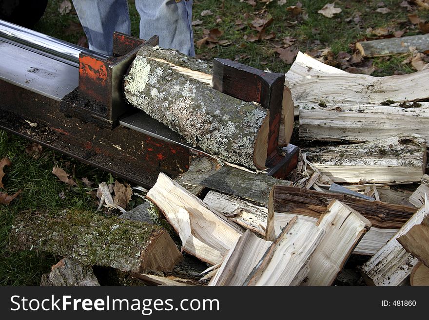 Log splitting tool used for fireplace and heating. Piston shown here with logs as alternative fuel. Log splitting tool used for fireplace and heating. Piston shown here with logs as alternative fuel