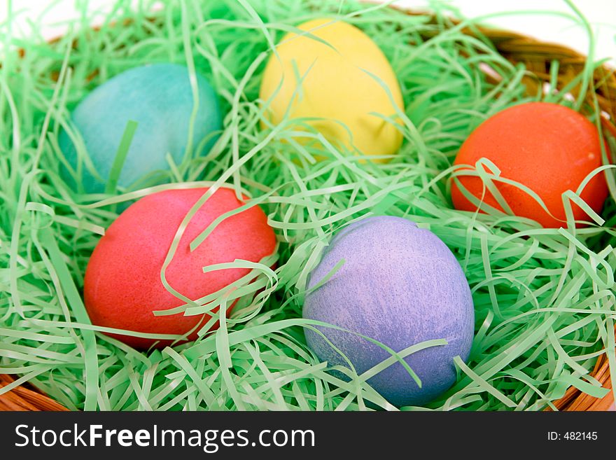 An easter basket filled with eggs. Closeup for background. An easter basket filled with eggs. Closeup for background.