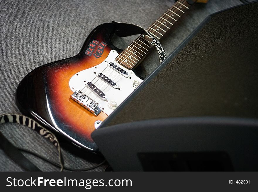 Guitar and speakers on stage. Guitar and speakers on stage.