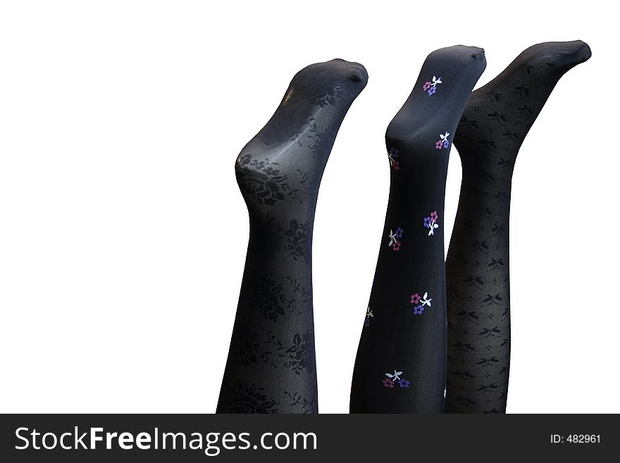 Three women's legs with stockings- isolated. Three women's legs with stockings- isolated.