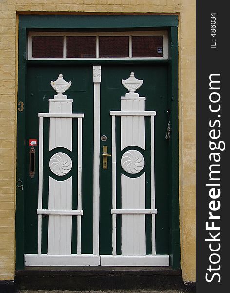 An old door in a town in the Jutland area of Denmark. An old door in a town in the Jutland area of Denmark