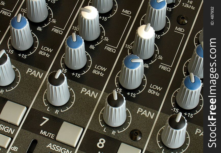 Closeup of knobs of a sound mixer