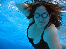 Fit Woman Swimming Stock Image