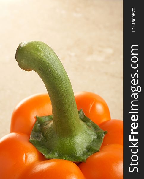 Closeup of orange pepper with copyspace for text