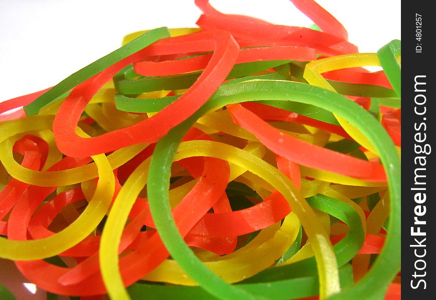 Collection of green red and yellow rubber bands. Collection of green red and yellow rubber bands