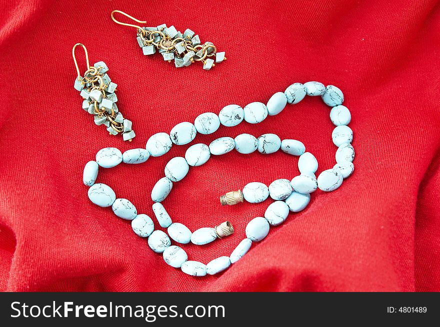 Turquoise beads and earrings theme. . Turquoise beads and earrings theme.