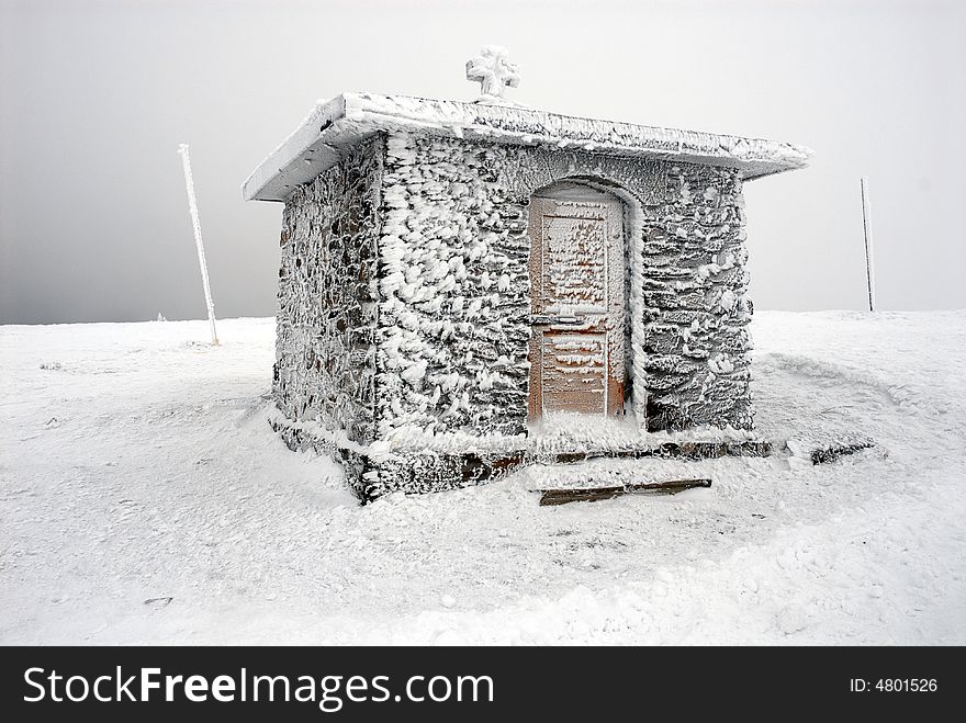 Chapel in winter in the mountains of Czech Republic