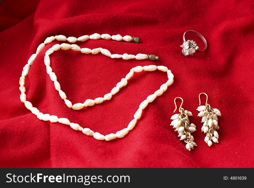 Pearl beads, earings and ring. Pearl beads, earings and ring