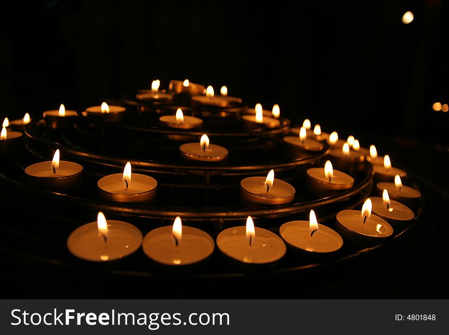 Fired candles in church (France - Notre Damme).