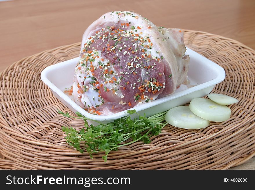 Ham strewed by seasoning with an onions