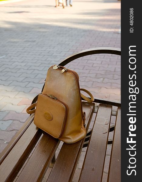 Photo of knapsack lost by an young lady on the bench. Photo of knapsack lost by an young lady on the bench