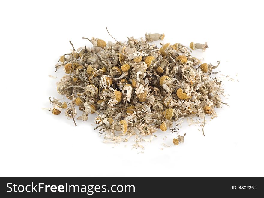 Dried chamomile on a white background. Dried chamomile on a white background.