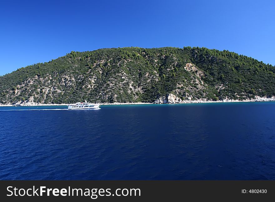 Tropical blue sea landscape with ferry