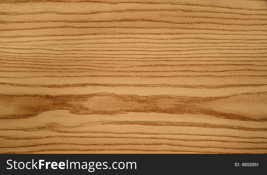 Wood grain background texture spotlit. Wood grain background texture spotlit