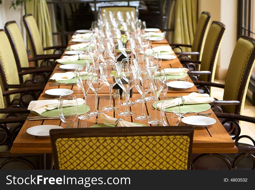 An image of a veranda restaurant seating area table setting