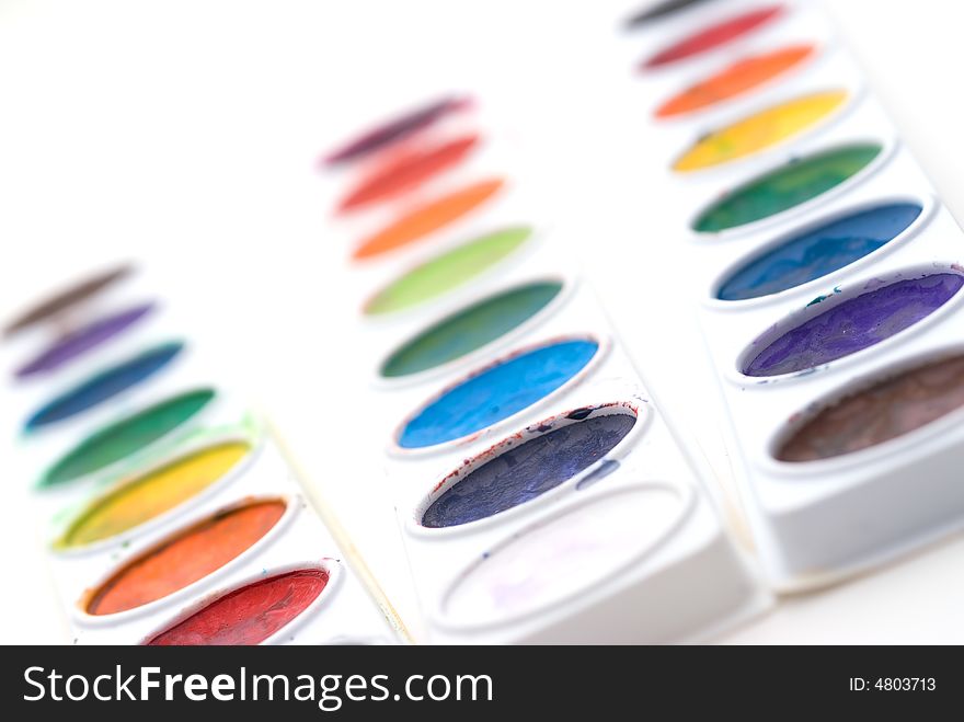 Shallow focus closeup of a child's paint trays