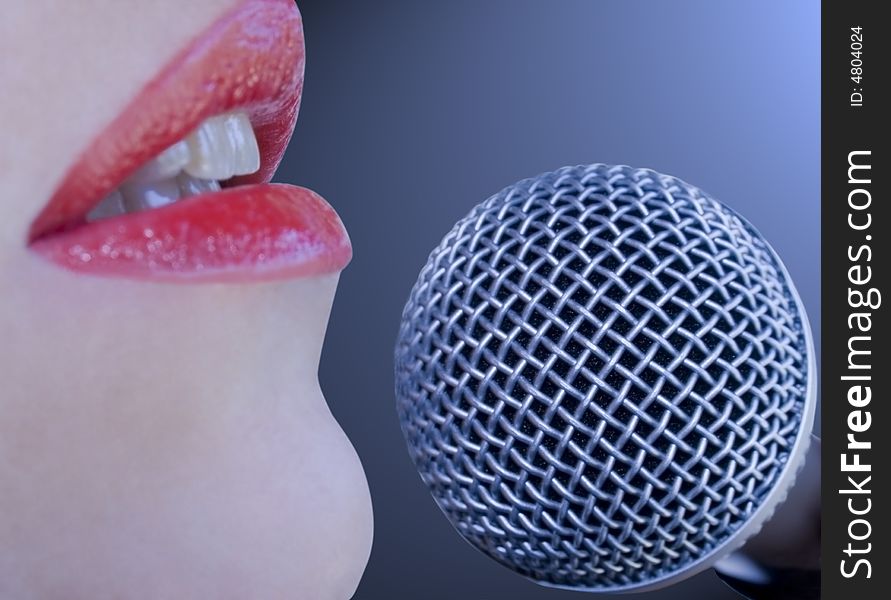 Close up of mouth and microphone. Picture is soft focused, has a dreamy mood and looks like a drawing. Close up of mouth and microphone. Picture is soft focused, has a dreamy mood and looks like a drawing.