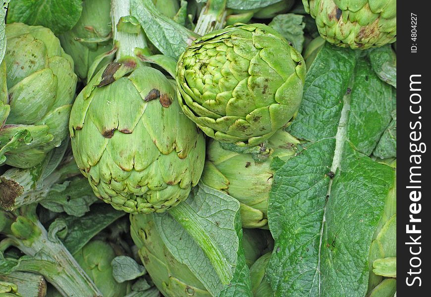 Raw Artichokes At A Market