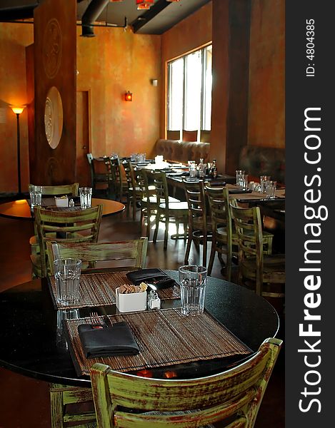 Restaurant interior with tables and chairs. Restaurant interior with tables and chairs