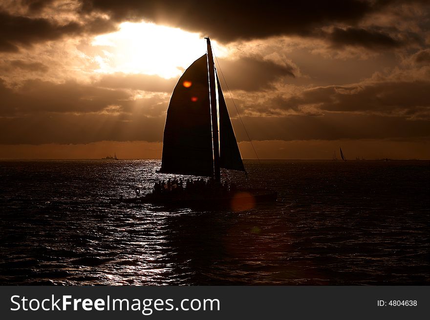 Sunset with a sail on the pacific. Sunset with a sail on the pacific