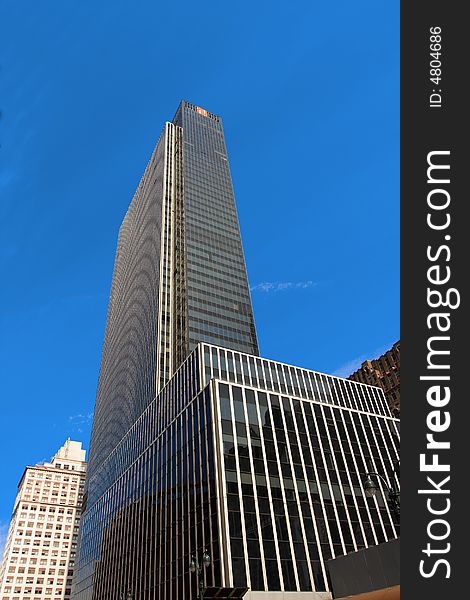 Reflective corporate buildings on a clear day in manhattan. Reflective corporate buildings on a clear day in manhattan