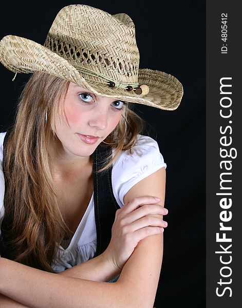 Beautiful model with blue eyes and straw hat. Beautiful model with blue eyes and straw hat