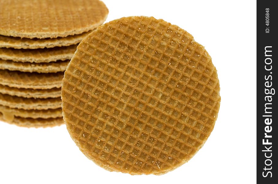 Dutch waffle called a stroopwafel isolated on a white background. Dutch waffle called a stroopwafel isolated on a white background