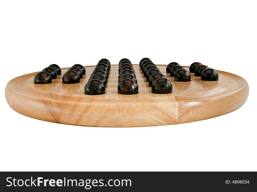 Wooden chinese game with marbles known as solitaire. Wooden chinese game with marbles known as solitaire