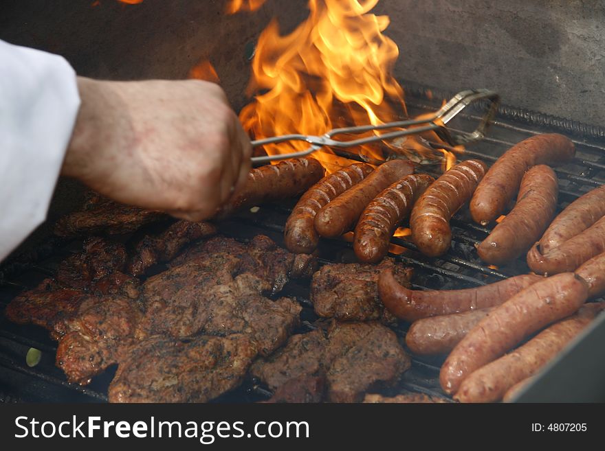 Close up of grilled meat and sausage, outdoor. Close up of grilled meat and sausage, outdoor