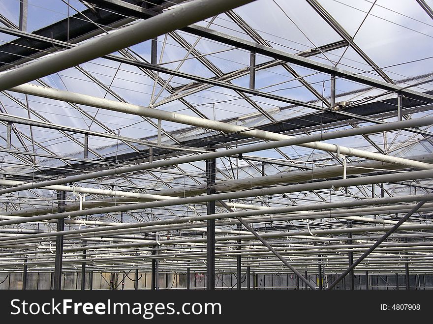 The roof conruction of a greenhouse with diagonal, horizontal and vertical lines