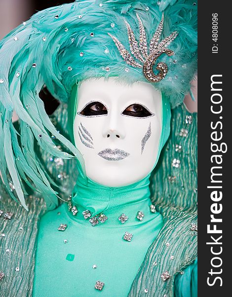 Wonderful turquoise costume at the Venice Carnival. Wonderful turquoise costume at the Venice Carnival