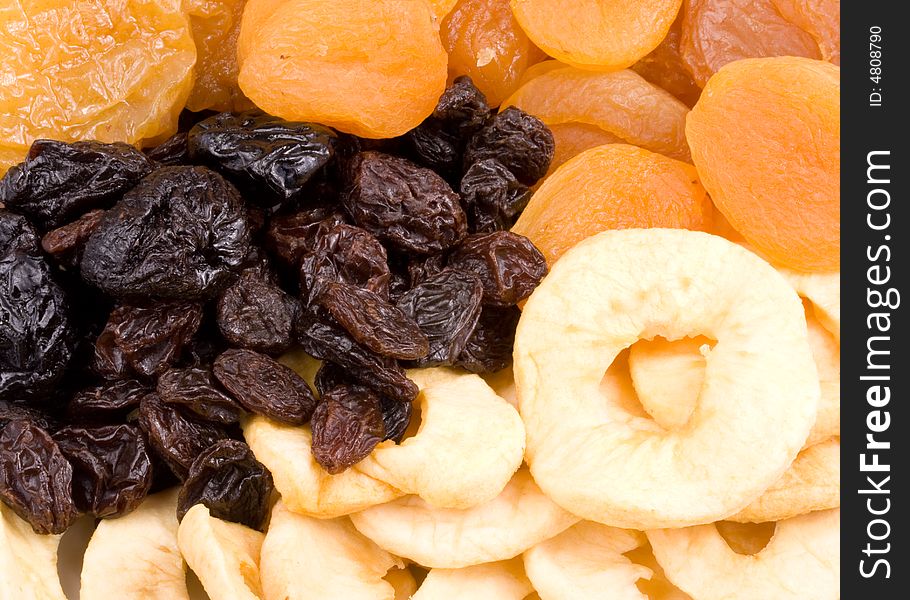 Background from tasty appetizing dried fruits. Background from tasty appetizing dried fruits